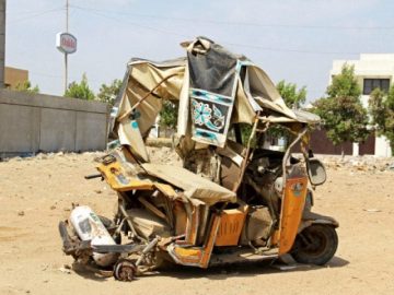 "Destroyed school rickshaw after high-speed racing accident in Muzaffargarh, Pakistan"