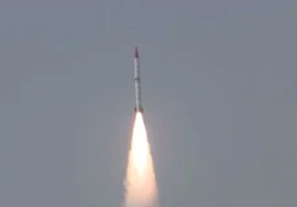 A Pakistan-made anti-ship ballistic missile launching into the sky, emitting bright flames during its successful test flight.