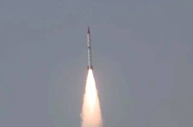 A Pakistan-made anti-ship ballistic missile launching into the sky, emitting bright flames during its successful test flight.