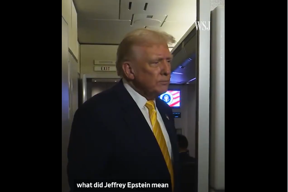 Former U.S. President Donald Trump stands inside an aircraft corridor, looking serious as a reporter asks him a question related to Jeffrey Epstein.