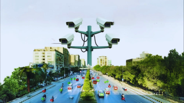 Highway surveillance cameras monitoring traffic on a busy Karachi road with vehicles highlighted for traffic violation detection.