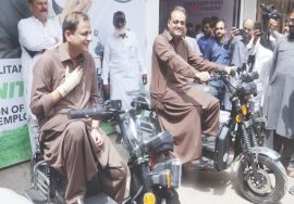 Karachi Mayor and officials testing new electric bikes during KMC e-bike launch ceremony in Karachi.