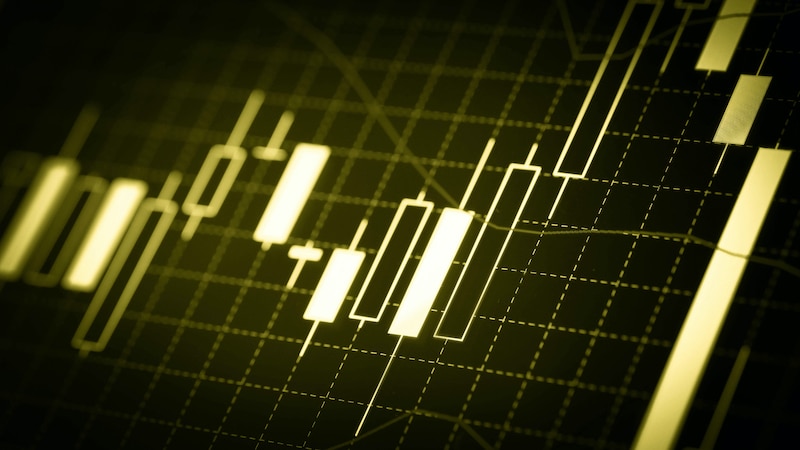 Golden stock market candlestick chart showing upward trend and record-high performance