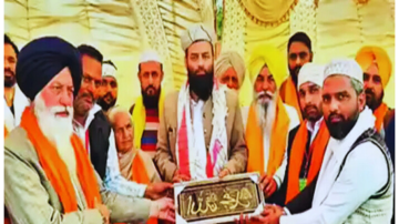 Sikh, Muslim and Hindu community members gathered together during a ceremony related to land donation for mosque construction in a Punjab village, India
