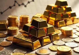 "Gold bars and stacked coins placed on a financial chart showing market fluctuations."