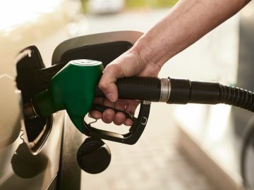 “A person refueling a vehicle with petrol at a fuel station, representing rising petrol and diesel prices in Pakistan.”