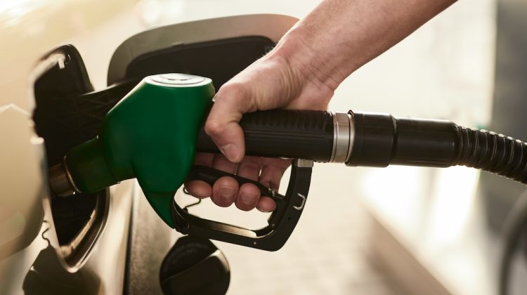 “A person refueling a vehicle with petrol at a fuel station, representing rising petrol and diesel prices in Pakistan.”