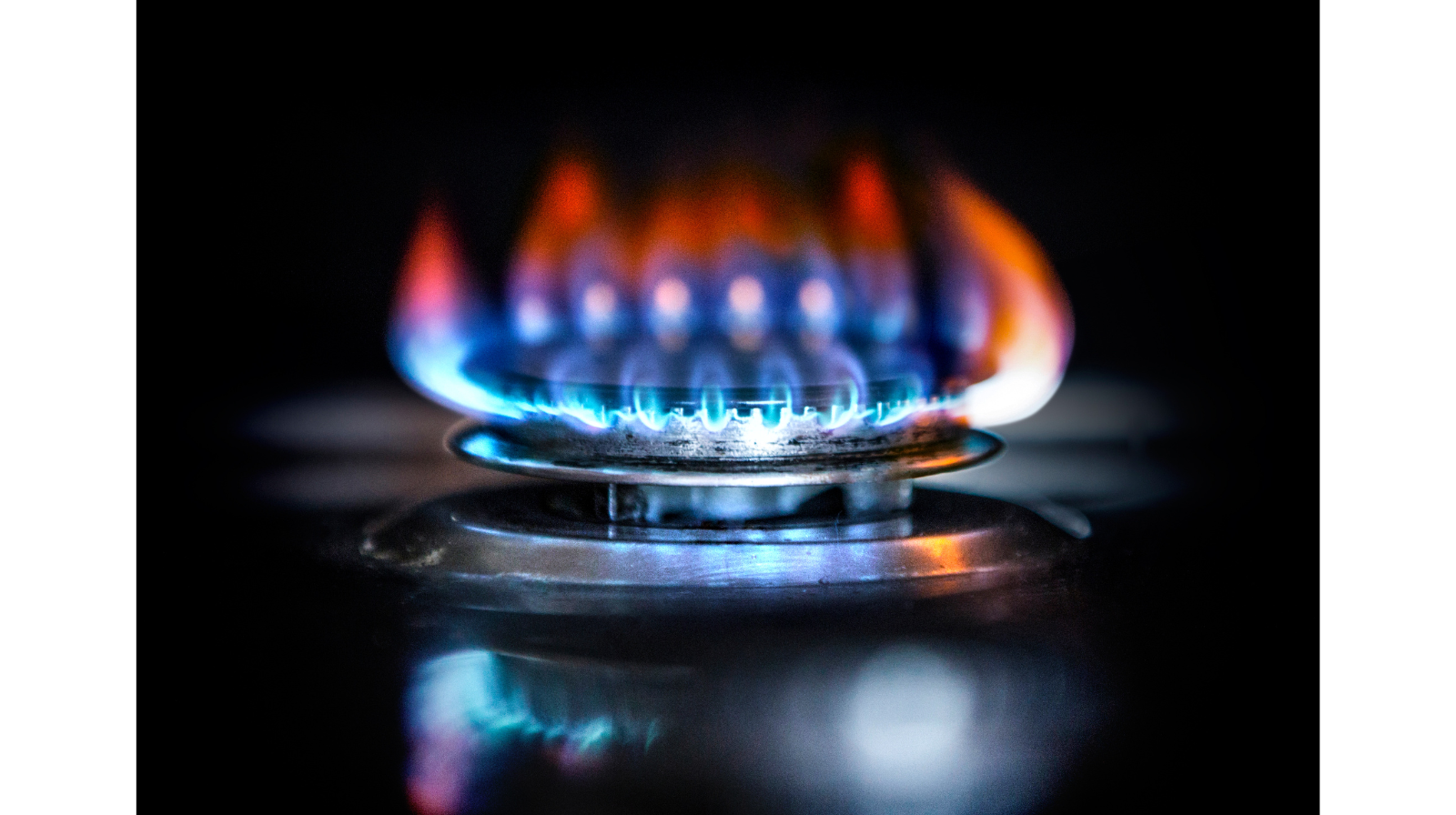 Gas stove burner with blue flame during 24-hour gas supply suspension in Karachi