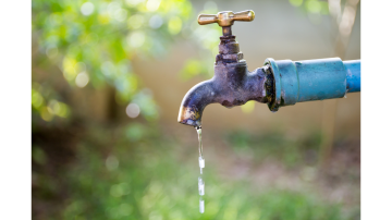 Water tap dripping due to water shortage during Karachi water supply suspension